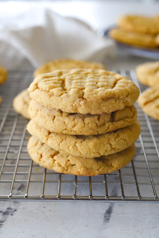 stack of peanut butter cookies on a cooling rack