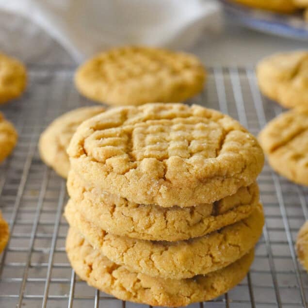 stack of peanut butter cookies on a cooling rack