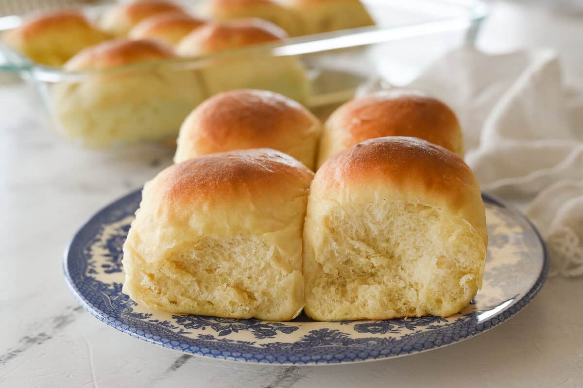 side view of four rolls on a plate