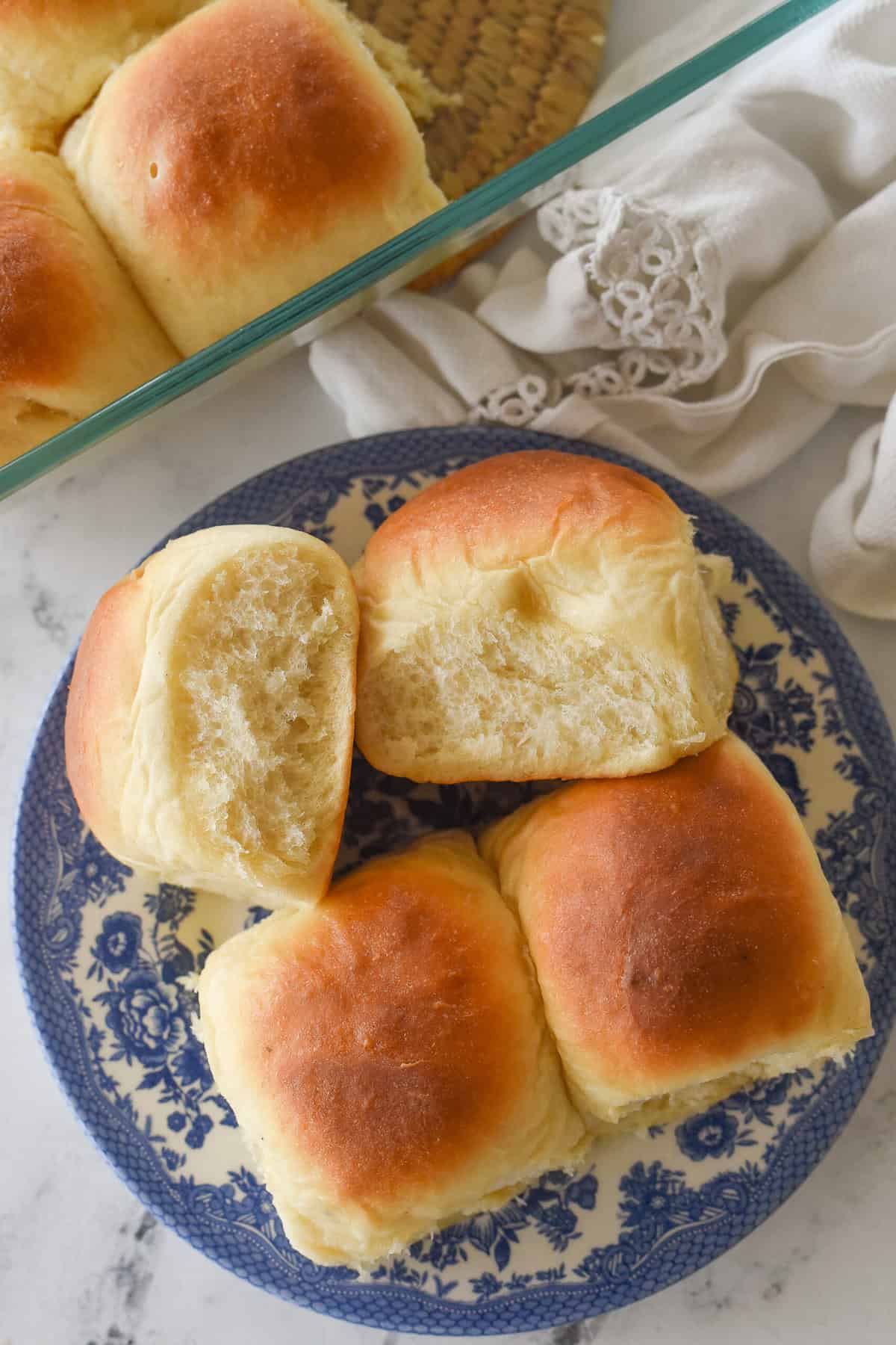 overhead shot of four rolls on a plate