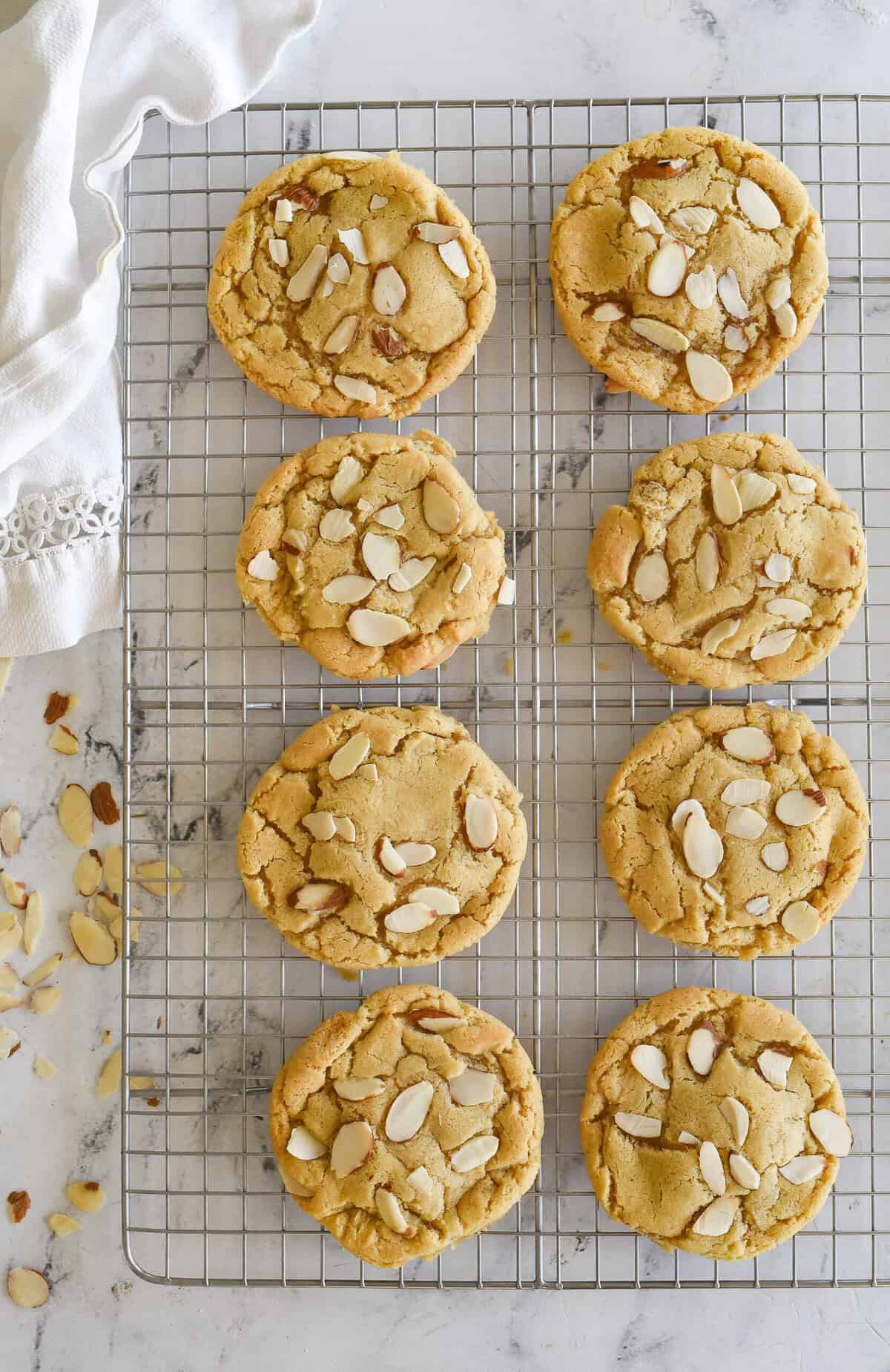 almond croissant cookies cooling on a baking rack