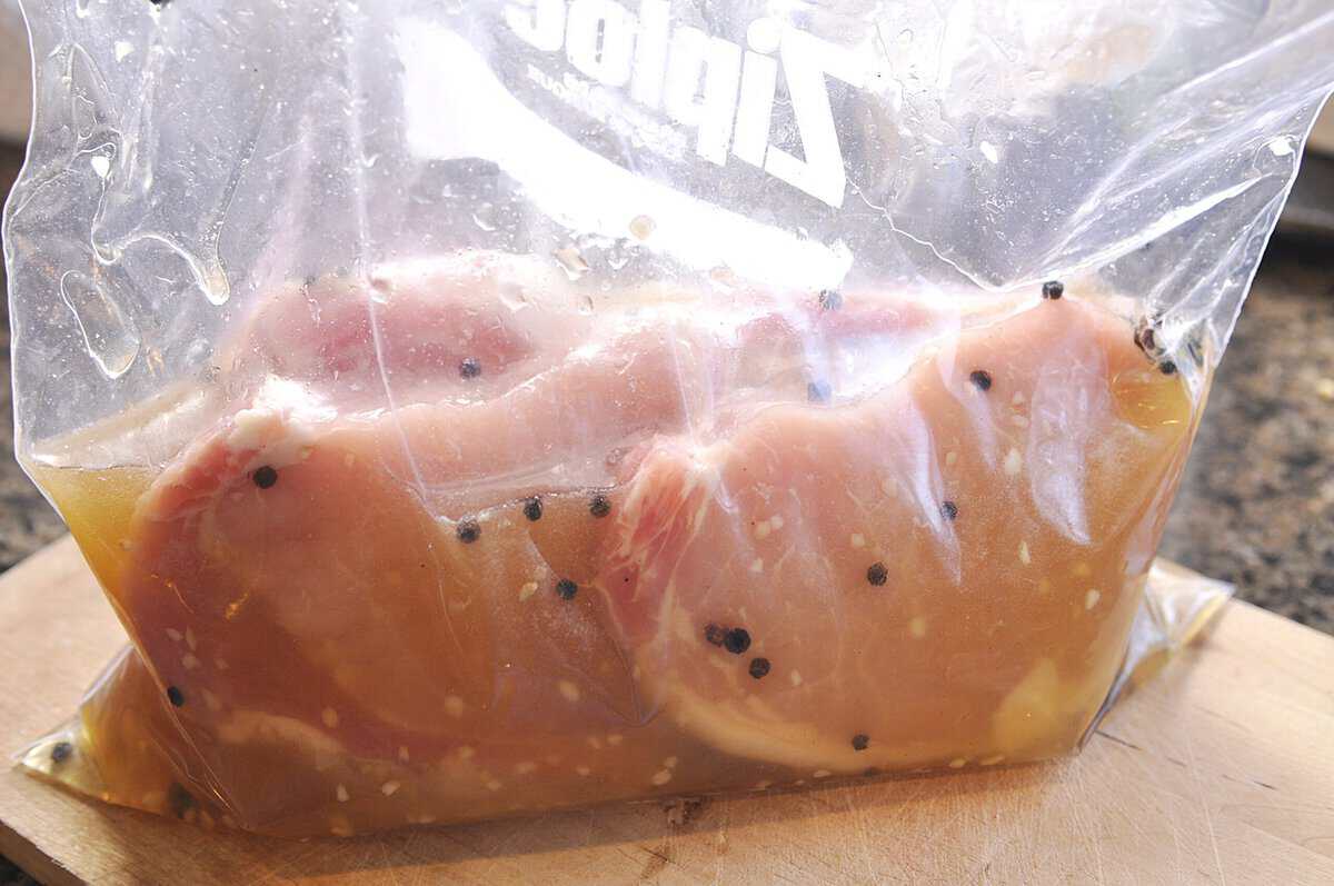 pork brine plastic bag of pork chops in a brine