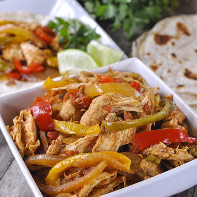 white bowl of chicken fajita meat