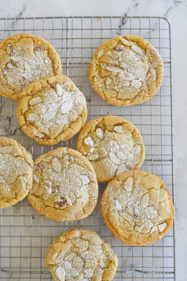 almond croissant cookies on a coolng rack