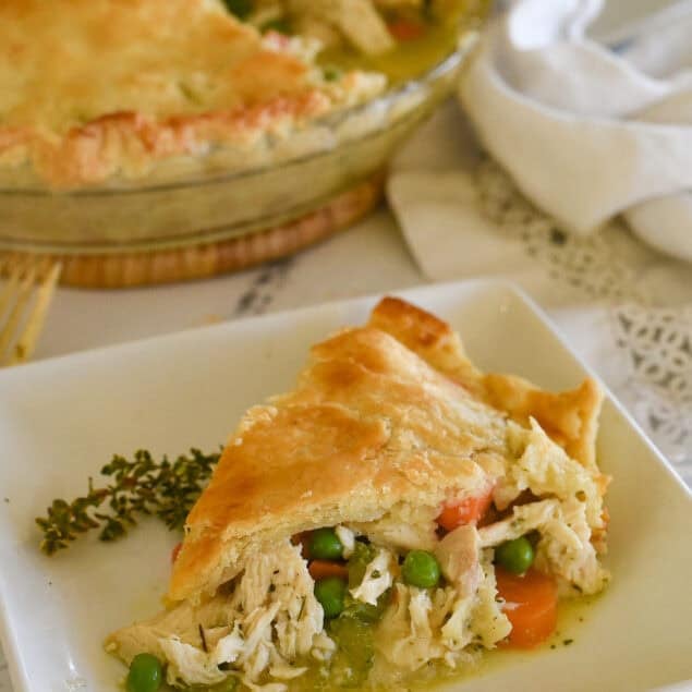 slice of chicken pot pie on a white plate