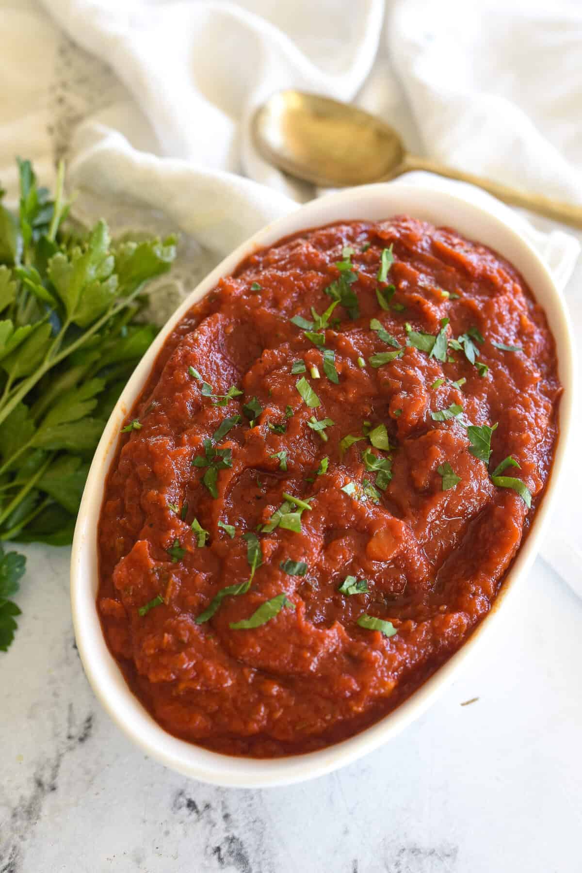overhead shot of a bowl of marinara sauce