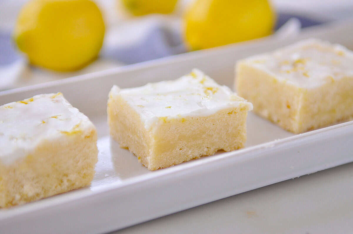 tray with three pieces of lemon shortbread on it