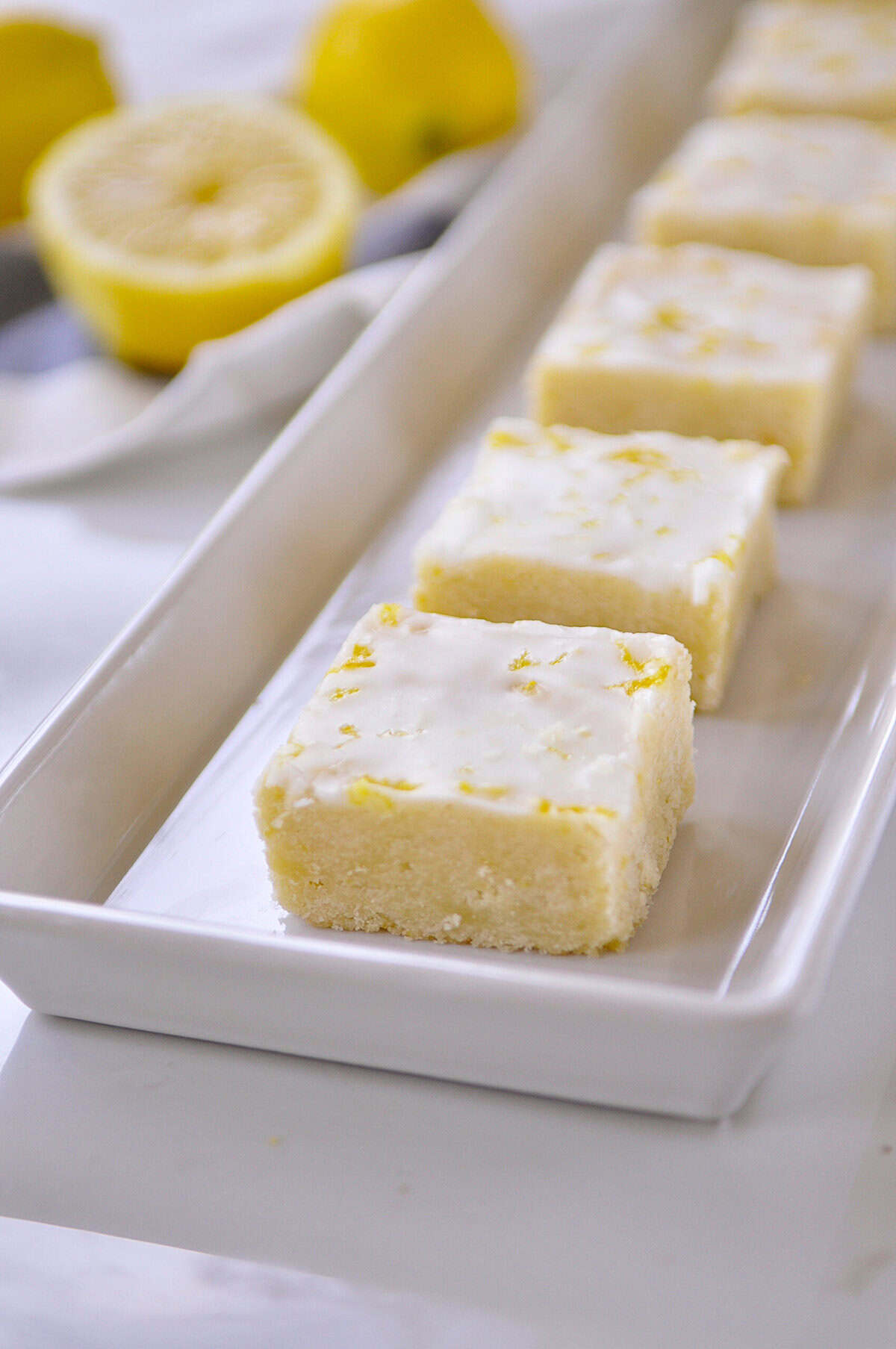 shortbread squares on a white tray