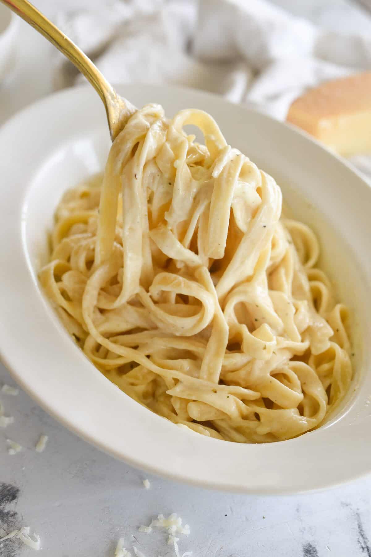 fork full of fettucine al fredo