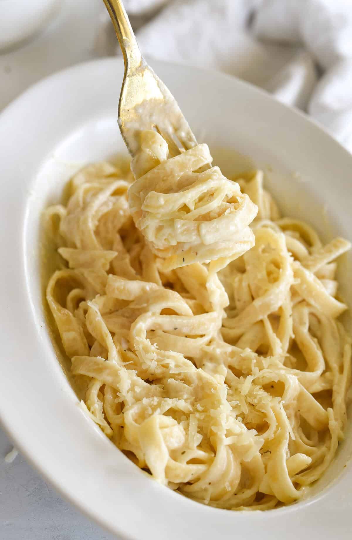 fork full of fettucine al fredo