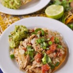 chicken tostada on a white plate