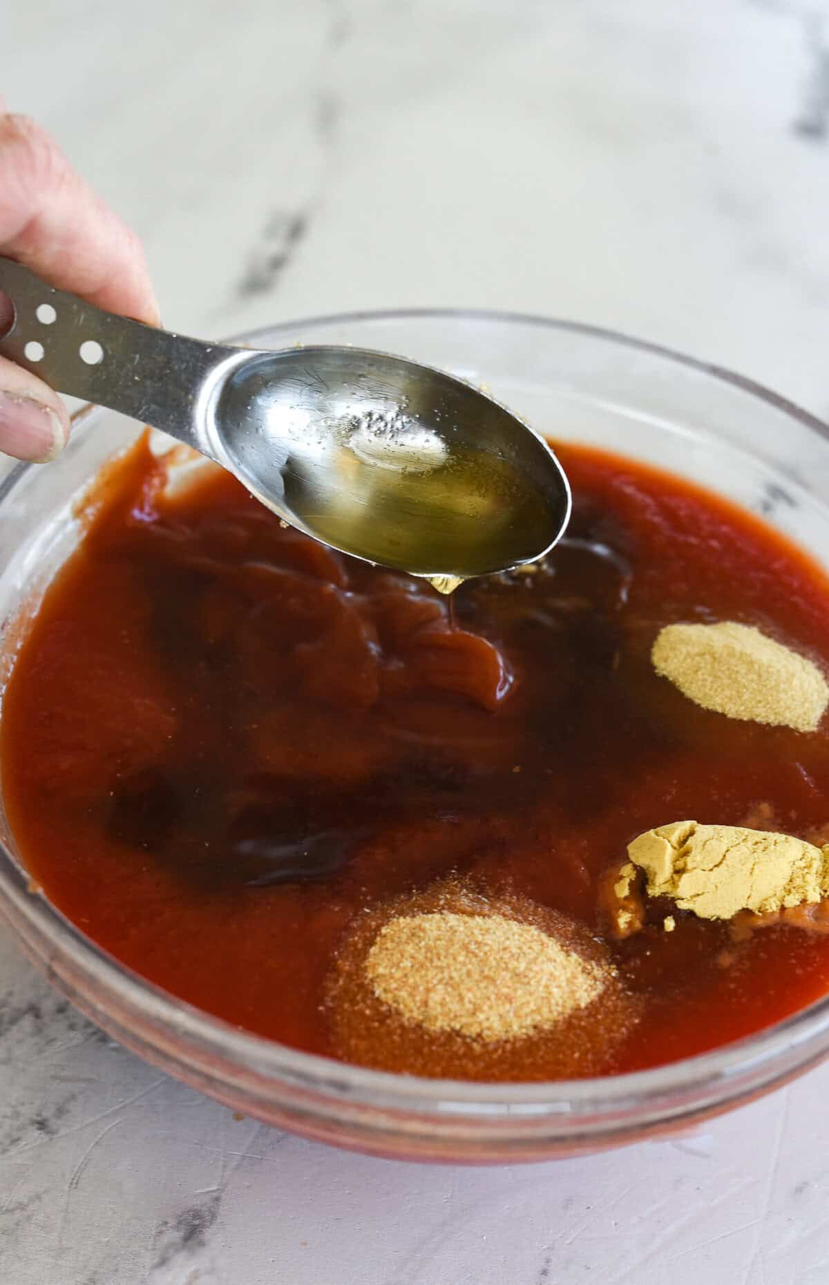 mixing up sauce for sloppy joes