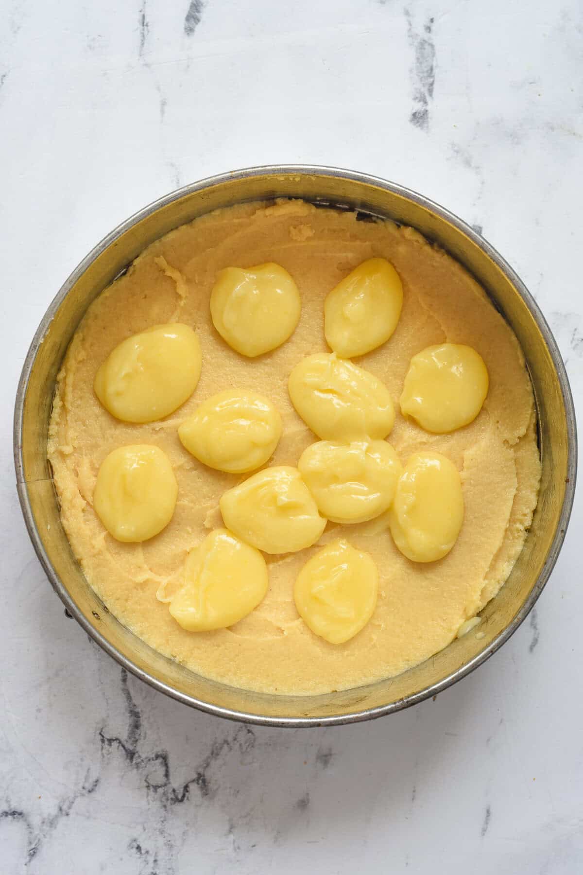 lemon curd on top of cake batter
