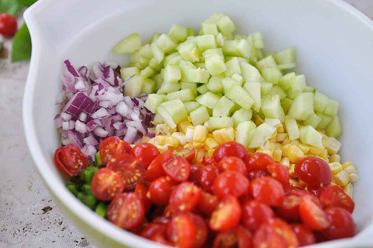 bowl of ingredients for corn salad combined