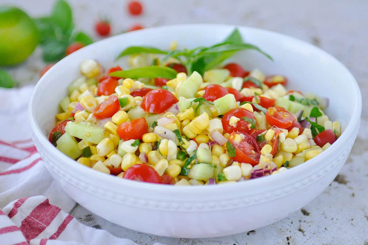 side view of a bowl of corn salad