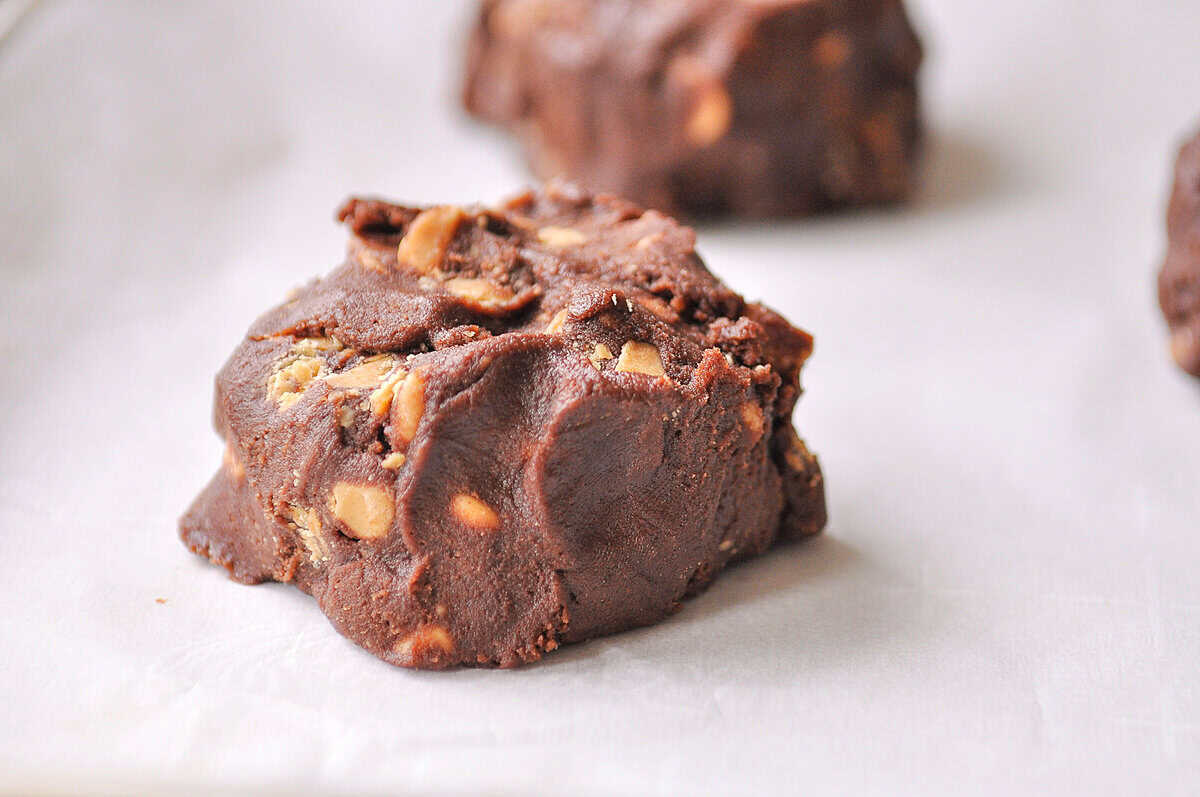 chocolate peanut butter cookies dough for peanut butter chocolate chip cookie dough on a baking sheet