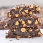 stack of three cookies cut in half - peanut butter chocolate chip cookies