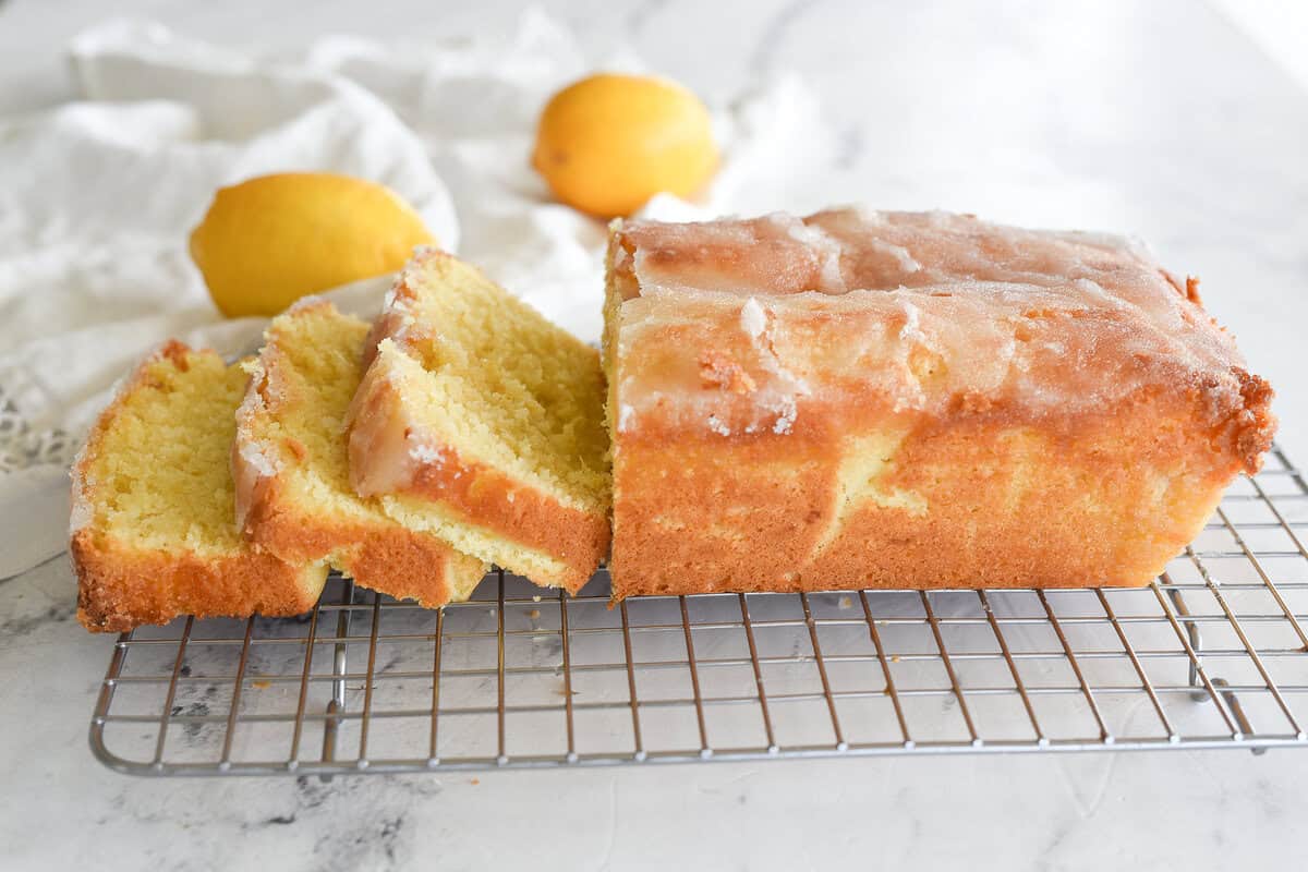 side view of sliced lemon drizzle cake