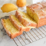 side view of sliced lemon drizzle cake