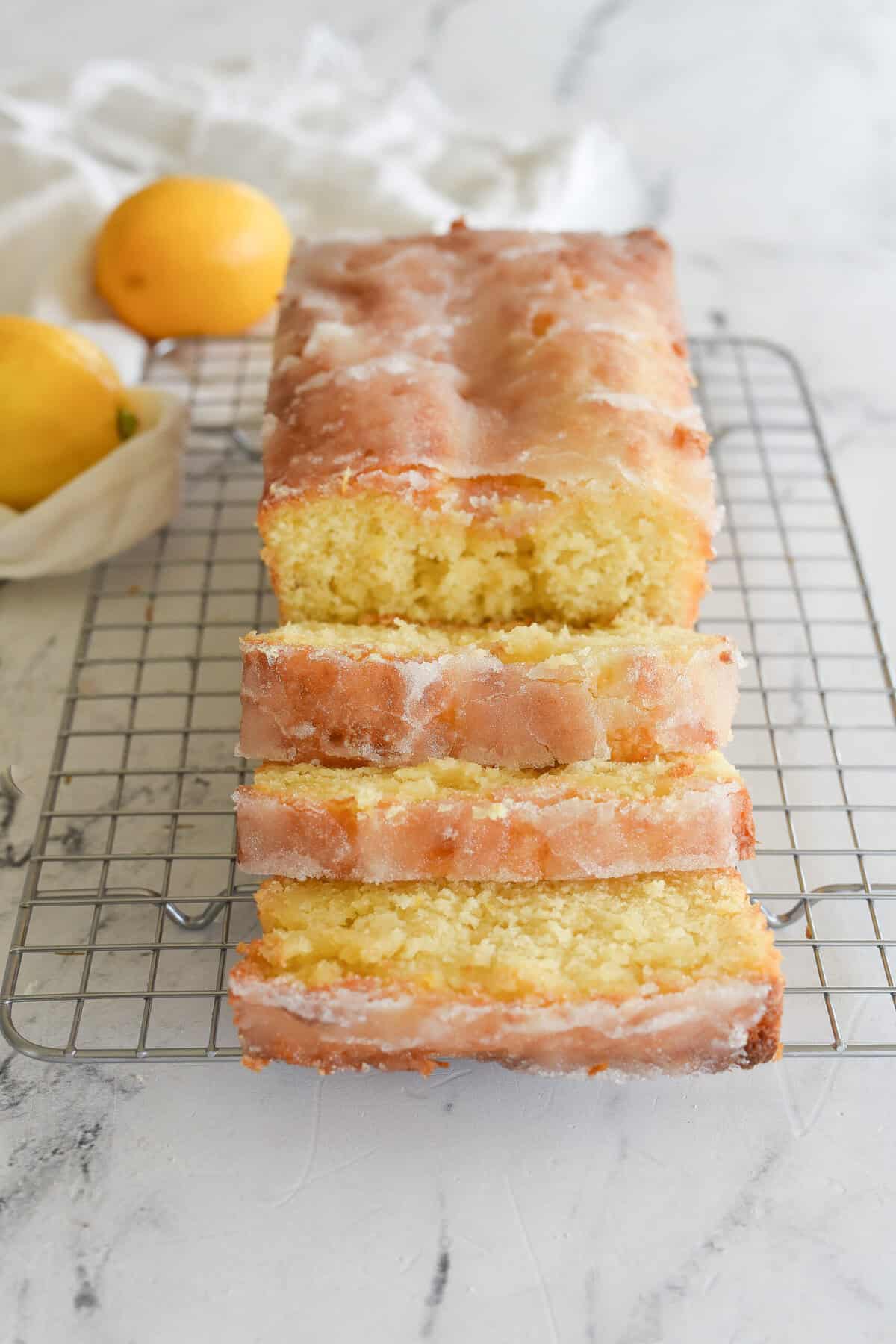 loaf of lemon drizzle sliced