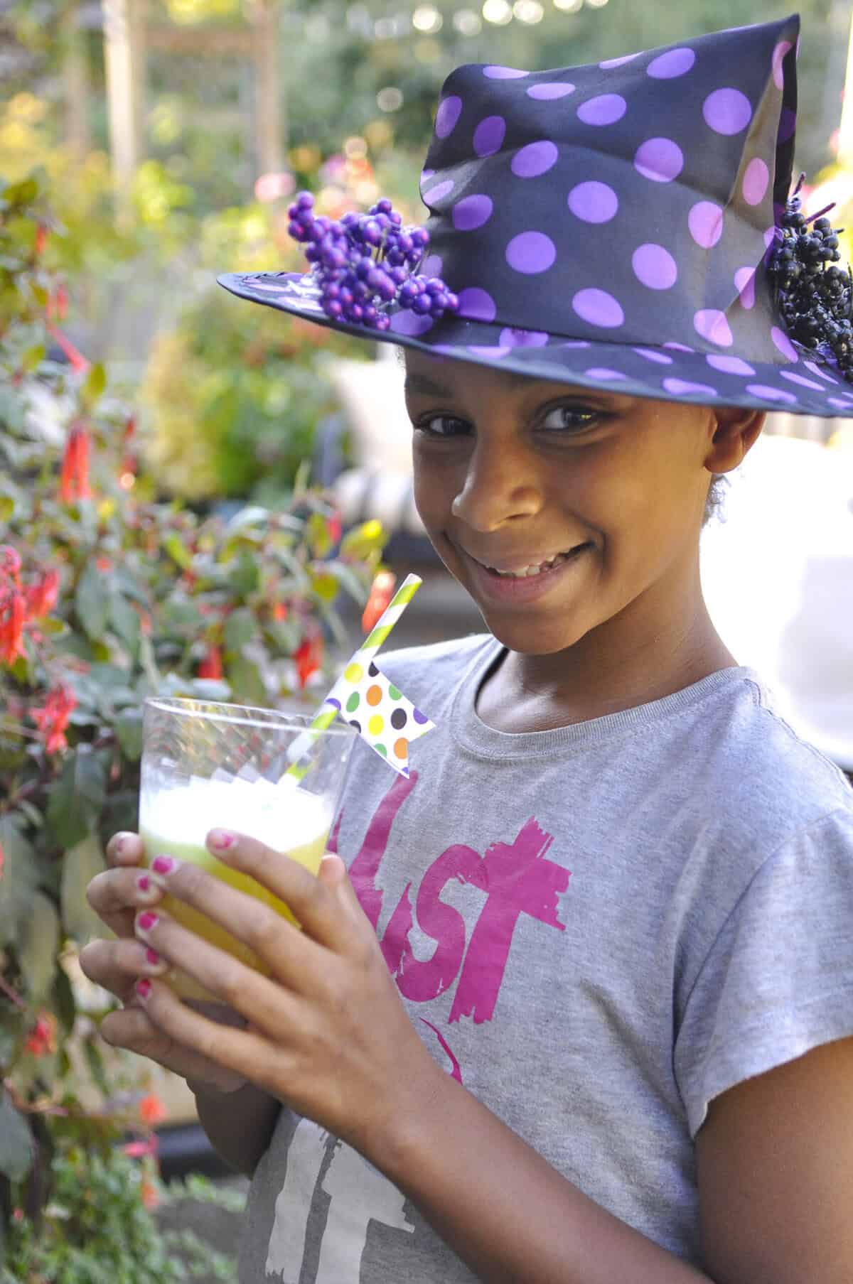 girl drinking witch's brew