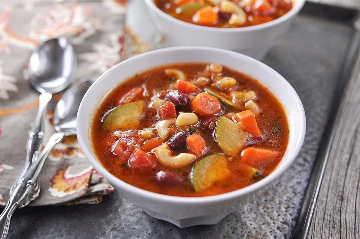 ministrone white bowl of minestrone soup